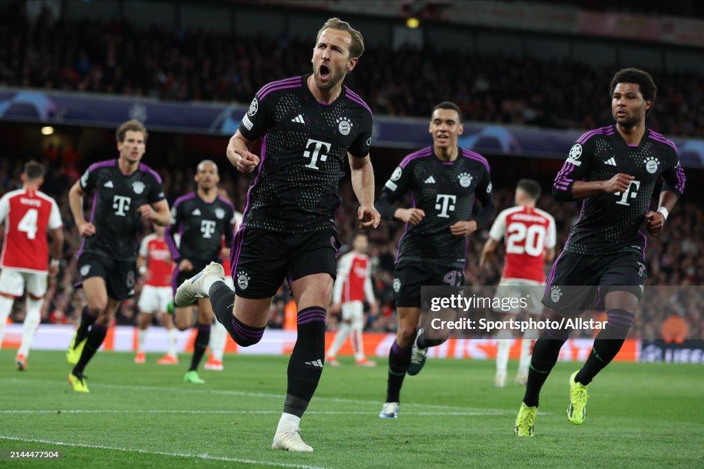 Harry Kane of <strong><a  data-cke-saved-href='https://www.vavel.com/en-us/soccer/2023/10/29/1161069-4-things-we-learnt-from-leverkusens-win-over-freiburg.html' href='https://www.vavel.com/en-us/soccer/2023/10/29/1161069-4-things-we-learnt-from-leverkusens-win-over-freiburg.html'>Bayern Munich</a></strong> celebrates the second goal during the UEFA Champions League quarter-final first leg match between Arsenal FC and FC Bayern München at Emirates Stadium on April 9, 2024 in London, England. (Photo by Ed Sykes/Sportsphoto/Allstar via Getty Images)