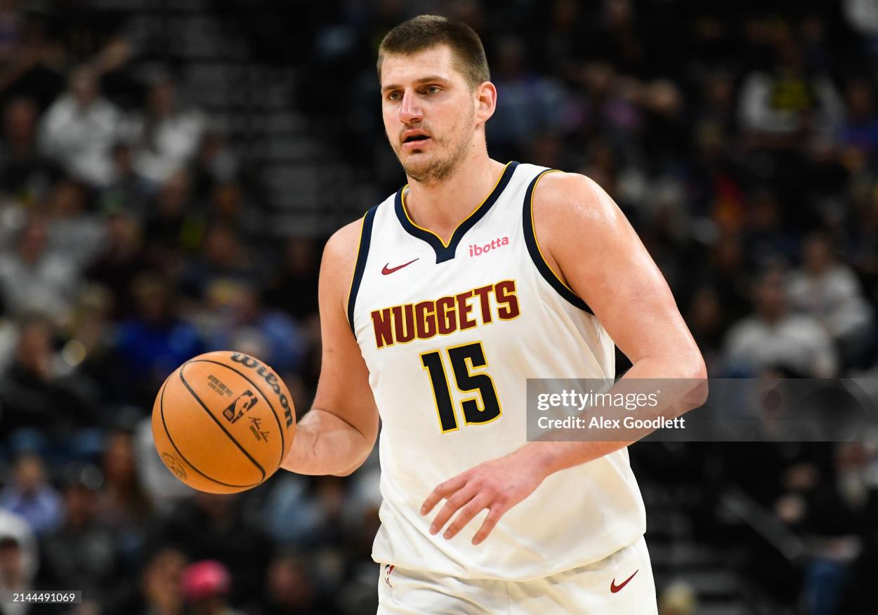 Serbian big man <strong><a  data-cke-saved-href='https://www.vavel.com/en-us/nba/2024/02/24/1173767-current-nba-player-nicknames-and-the-meaning-behind-them.html' href='https://www.vavel.com/en-us/nba/2024/02/24/1173767-current-nba-player-nicknames-and-the-meaning-behind-them.html'>Nikola Jokic</a></strong> brings the ball up the court (Photo by Alex Goodlett/Getty Images)