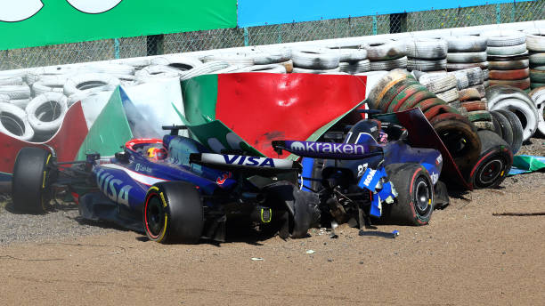 Daniel Ricciardo of Australia and Visa Cash App RB and Alexander Albon of Thailand and Williams after crashing during the F1 Grand Prix of Japan at Suzuka International Racing Course on April 07, 2024 in Suzuka, Japan. (Photo by Clive Rose - Formula 1/Formula 1 via Getty Images)