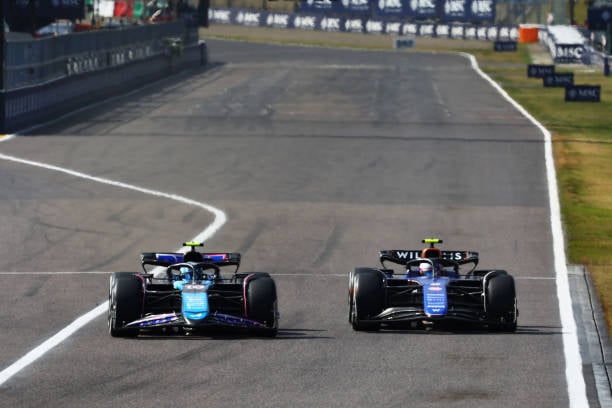 Pierre Gasly of France driving the (10) Alpine F1 A524 Renault passes Logan Sargeant of United States driving the (2) Williams FW46 Mercedes on track during the F1 Grand Prix of Japan at Suzuka International Racing Course on April 07, 2024 in Suzuka, Japan. (Photo by Mark Thompson/Getty Images)