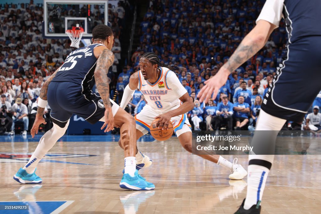 Jalen Williams #8 of the Oklahoma City Thunder dribbles the ball during the game against the Dallas Mavericks during Round 2 Game 1 of the 2024 NBA Playoffs on May 7, 2024 at Paycom Arena in Oklahoma City, Oklahoma. NOTE TO USER: User expressly acknowledges and agrees that, by downloading and or using this photograph, User is consenting to the terms and conditions of the Getty Images License Agreement. Mandatory Copyright Notice: Copyright 2024 NBAE (Photo by Joe Murphy/NBAE via Getty Images)