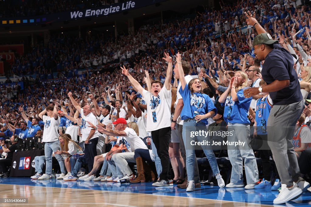 Oklahoma City Thunder fans celebrates during the game against the Dallas Mavericks during Round 2 Game 1 of the 2024 NBA Playoffs on May 7, 2024 at Paycom Arena in Oklahoma City, Oklahoma. NOTE TO USER: User expressly acknowledges and agrees that, by downloading and or using this photograph, User is consenting to the terms and conditions of the Getty Images License Agreement. Mandatory Copyright Notice: Copyright 2024 NBAE (Photo by Joe Murphy/NBAE via Getty Images)