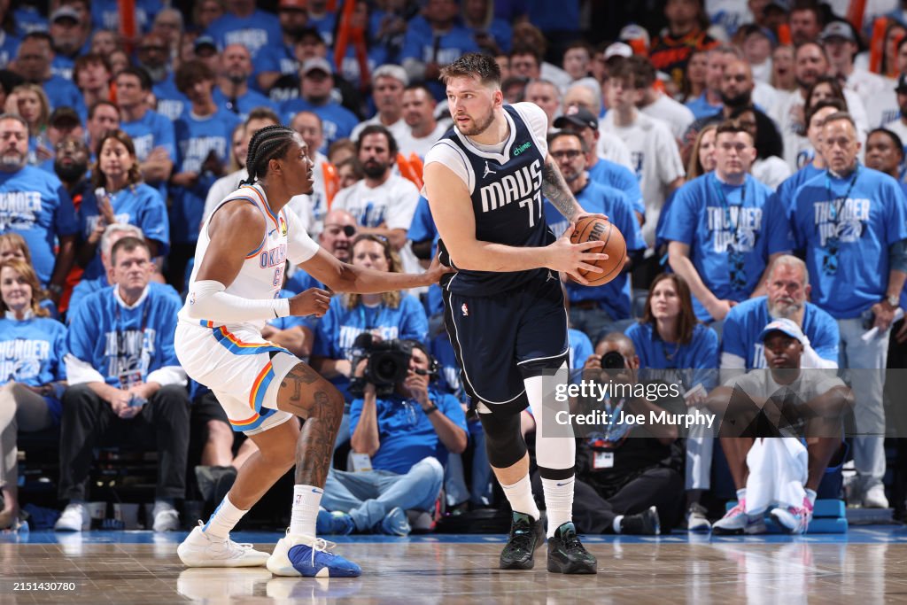 Luka Doncic #77 of the Dallas Mavericks handles the ball during the game against the Oklahoma City Thunder during Round 2 Game 1 of the 2024 NBA Playoffs on May 7, 2024 at Paycom Arena in Oklahoma City, Oklahoma. NOTE TO USER: User expressly acknowledges and agrees that, by downloading and or using this photograph, User is consenting to the terms and conditions of the Getty Images License Agreement. Mandatory Copyright Notice: Copyright 2024 NBAE (Photo by Joe Murphy/NBAE via Getty Images)