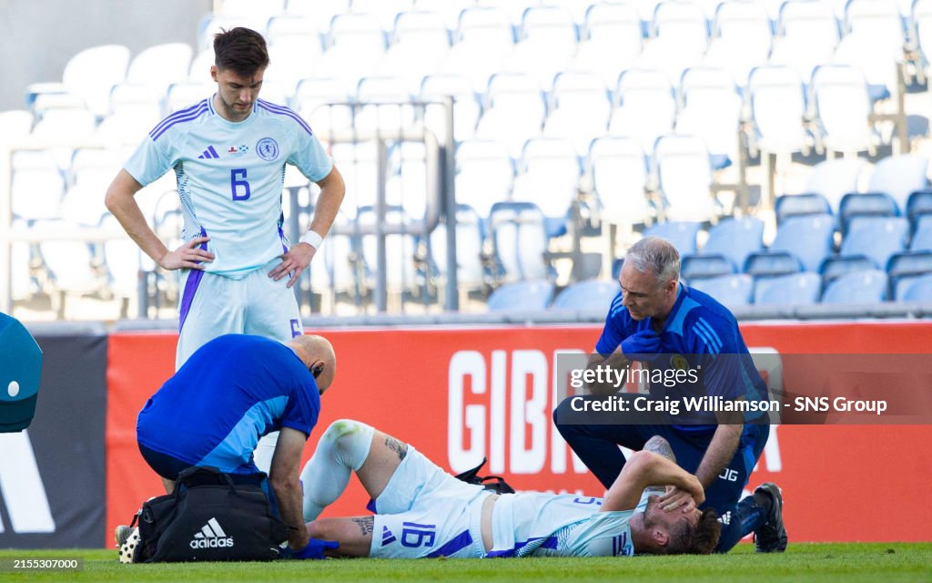 Liam Cooper receives treatment for an apparent knee injury (Photo by Craig Williamson/SNS Group via Getty Images)
