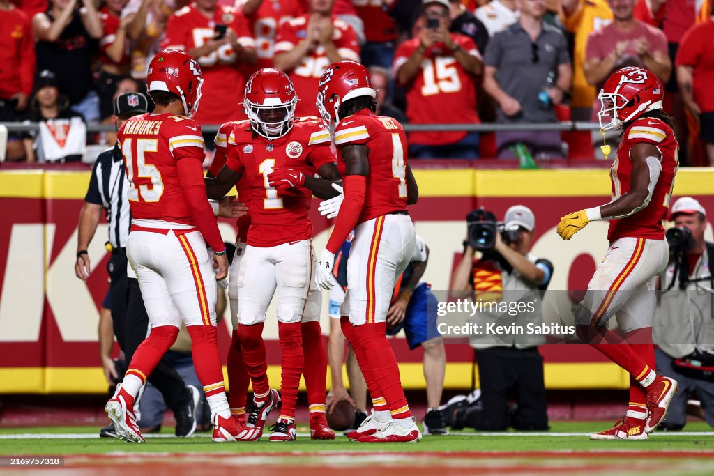 Xavier Worthy #1 of the Kansas City Chiefs celebrates with teammates after scoring a touchdown during the fourth quarter of an NFL football game against the Baltimore Ravens at GEHA Field at Arrowhead Stadium on September 5, 2024 in Kansas City, Missouri. (Photo by Kevin Sabitus/Getty Images)