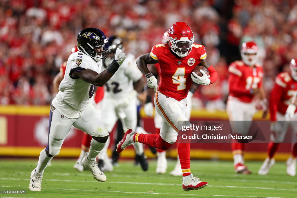 Rashee Rice #4 of the Kansas City Chiefs runs the ball against Roquan Smith #0 of the Baltimore Ravens during the first quarter at GEHA Field at Arrowhead Stadium on September 05, 2024 in Kansas City, Missouri. (Photo by Christian Petersen/Getty Images)