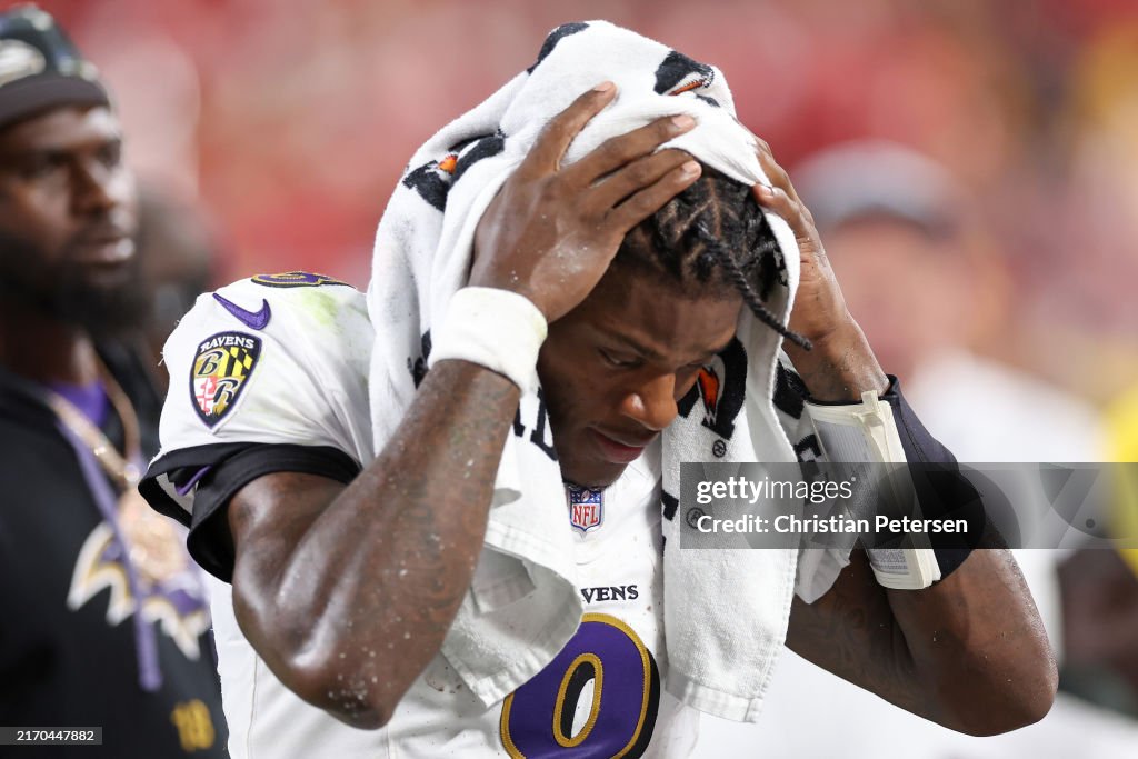 Quarterback Lamar Jackson #8 of the Baltimore Ravens looks on from the sidelines as they take on the Kansas City Chiefs during the second quarter at GEHA Field at Arrowhead Stadium on September 05, 2024 in Kansas City, Missouri. (Photo by Christian Petersen/Getty Images)