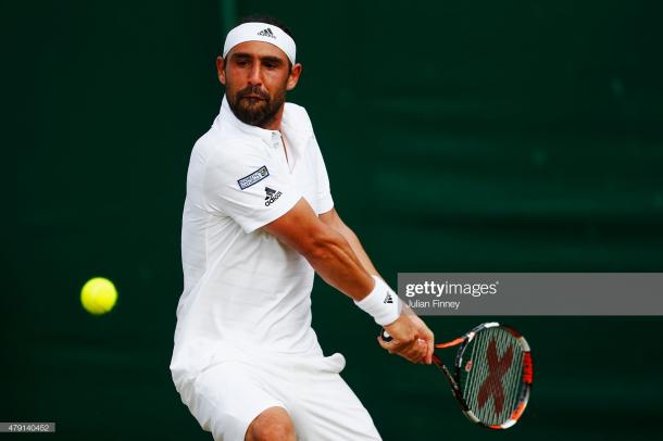 Baghdatis in action at Wimbledon in 2015 (Getty Images/Julian Finney)