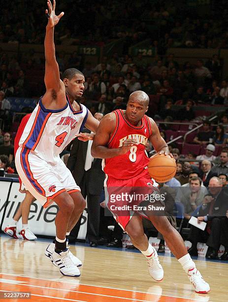 NEW YORK - NOVEMBER 23: Antoine Walker #8 of the Atlanta Hawks moves the ball against the New York Knicks on November 23, 2004 at Madison Square Garden in New York City. The Knicks defeated the Hawks 104-88. NOTE TO USER: User expressly acknowledges and agrees that, by downloading and/or using this Photograph, user is consenting to the terms and conditions of the Getty Images License Agreement. (Photo by Ezra Shaw/Getty Images)