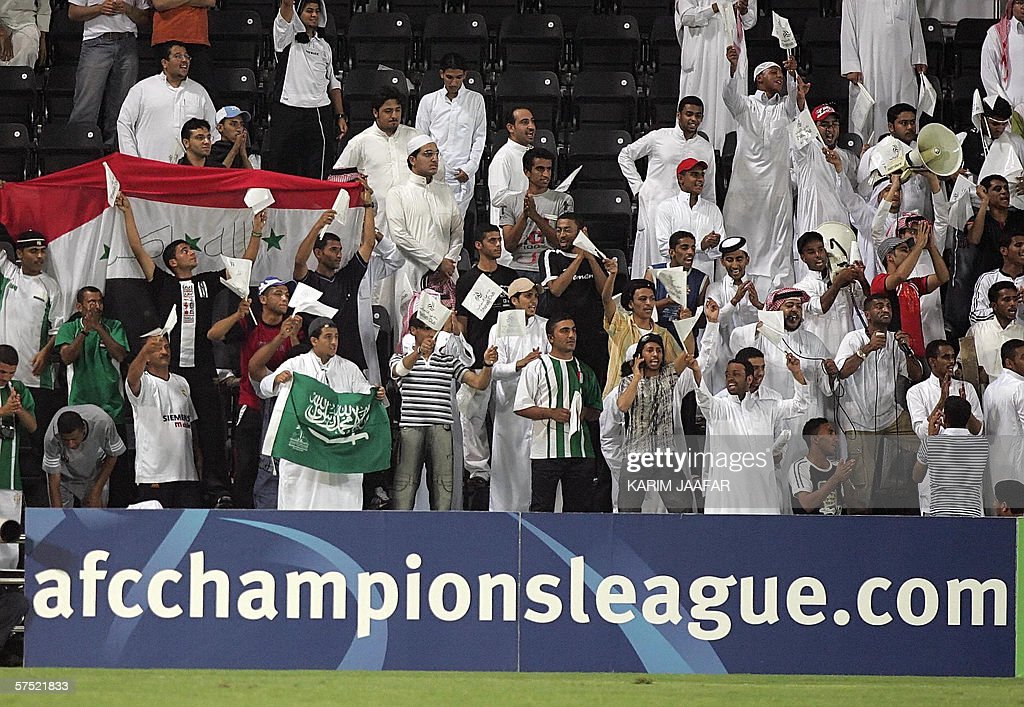 A group of Al-Shabab fans (Photo by KARIM JAAFAR/AFP via Getty Images)