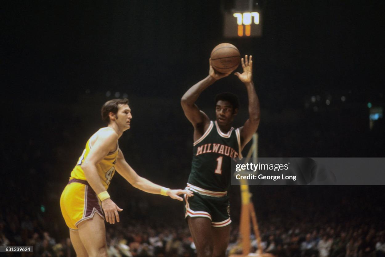 Milwaukee's Oscar Robertson handles the ball, guarded by LA's Jerry West (Photo by George Long /Sports Illustrated via Getty Images) (Set Number: X16529 TK1 R9 F13 )