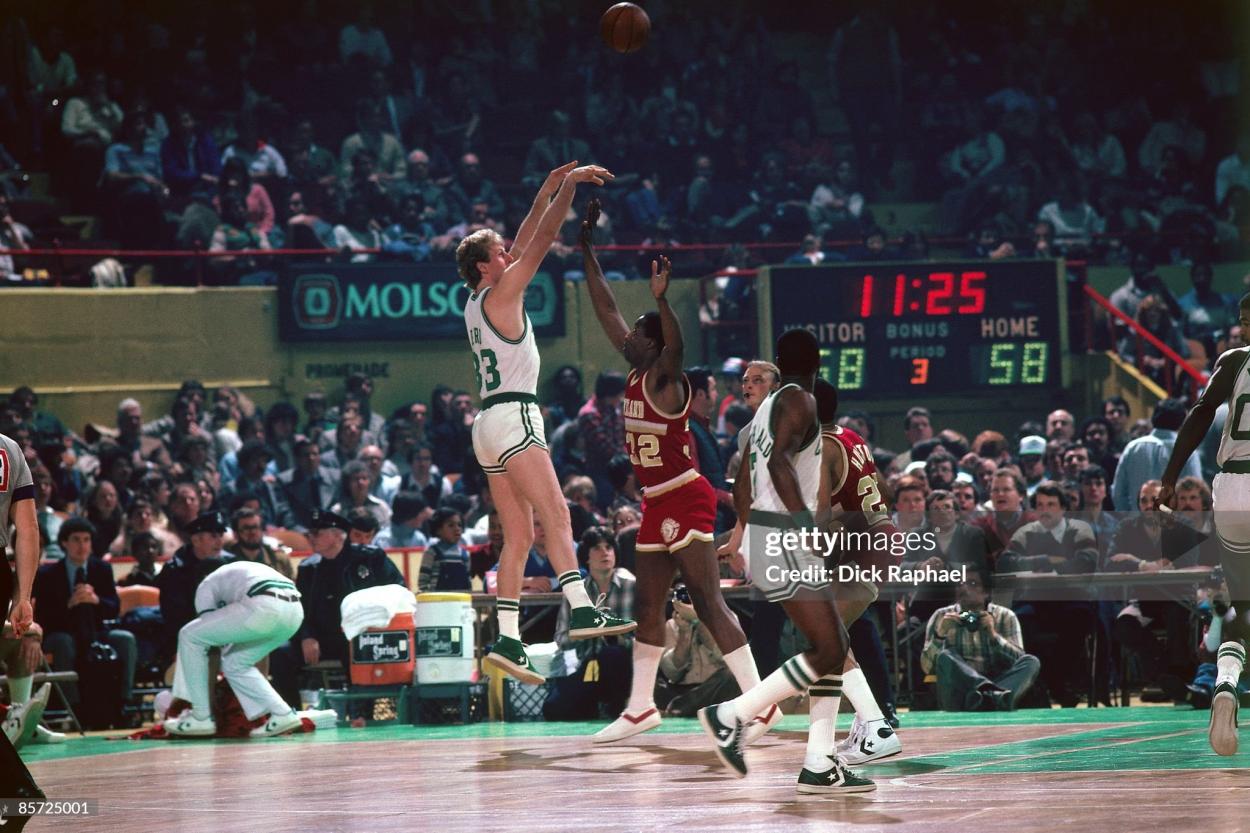 Larry Bird shoots a jump shot over Cleveland's Kenny Carr (Photo by Dick Raphael/NBAE via Getty Images)