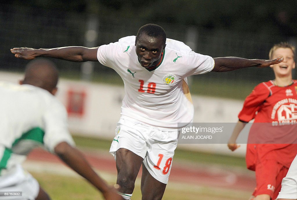 Senegalese Papis Demba Cisse jubilates after scoring during the friendly football match Senegal vs. Democratic Republic of Congo (DRC), on August 12, 2009 at Les Vallees stadium in Blois (central France). AFP PHOTO/ALAIN JOCARD (Photo credit should read ALAIN JOCARD/AFP via Getty Images)