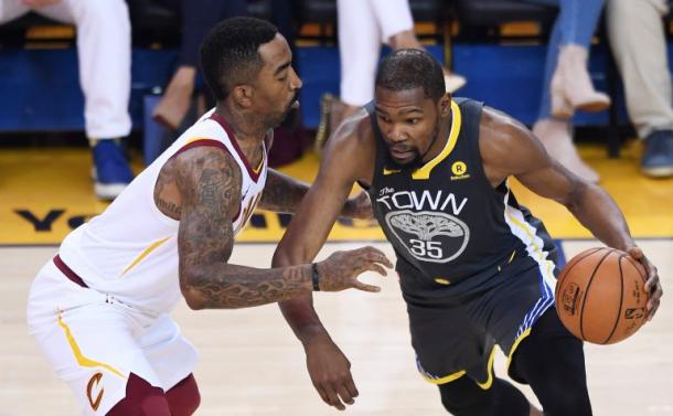 Durant drives against Cleveland's J.R. Smith during Game 2/Photo: Thearon W. Henderson/Getty Images