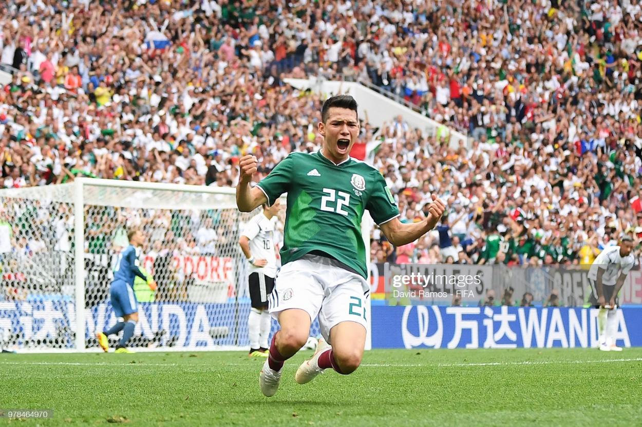 Hirving Lozano celebrates after scoring during the 2018 FIFA <strong><a  data-cke-saved-href='https://www.vavel.com/en/international-football/2022/10/19/1126826-qatar-world-cup-2022-preview-how-will-the-hosts-fare-in-their-first-ever-world-cup.html' href='https://www.vavel.com/en/international-football/2022/10/19/1126826-qatar-world-cup-2022-preview-how-will-the-hosts-fare-in-their-first-ever-world-cup.html'>World Cup</a></strong> match between Germany and Mexico (Photo by David Ramos - FIFA/FIFA via Getty Images)