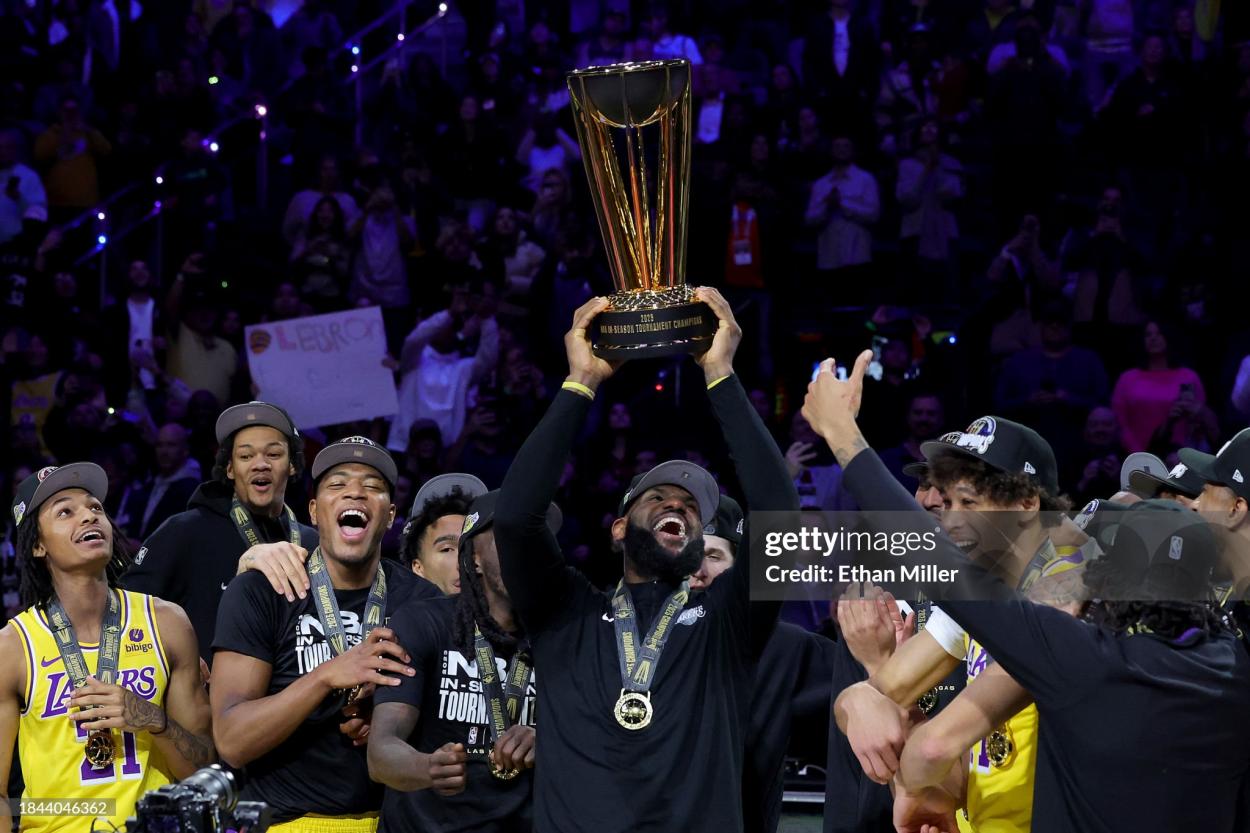 LeBron James #23 of the Los Angeles Lakers hoists the trophy with his teammates after winning the championship game of the inaugural NBA In-Season Tournament at T-Mobile Arena on December 09, 2023 in Las Vegas, Nevada. NOTE TO USER: User expressly acknowledges and agrees that, by downloading and or using this photograph, User is consenting to the terms and conditions of the Getty Images License Agreement. (Photo by Ethan Miller/Getty Images)