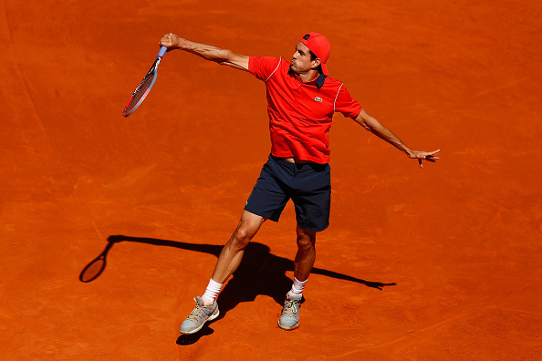 MADRID, SPAIN - MAY 05: Guillermo Garcia-Lopez of Spain in action against Fernando Verdasco of Spain during day four of the Mutua Madrid Open tennis tournament at the Caja Magica on May 5, 2015 in Madrid, Spain. (Photo by Julian Finney/Getty Images)