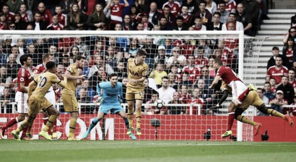 Ben Gibson scores his first Premier League goal against Spurs | Photo: Getty Images