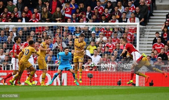 Ben Gibson beats Moussa Sissoko in the air to score Boro's only goal in the side's 2-1 loss to Spurs | Photo: Getty