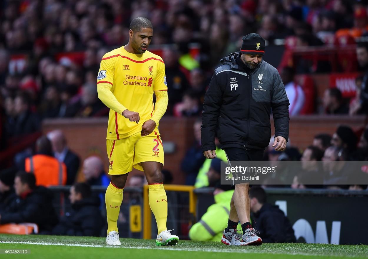 Glen Johnson of Liverpool goes off after sustaining an injury during the Barclays <b><a  data-cke-saved-href='https://www.vavel.com/en/data/premier-league' href='https://www.vavel.com/en/data/premier-league'>Premier League</a></b> match between Manchester United and Liverpool at Old Trafford on December 14, 2014. (Photo by Shaun Botterill/Getty Images)