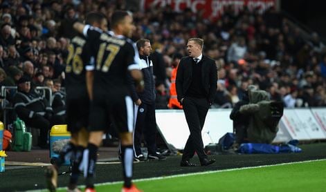 Monk (pictured, far right) during his last fixture in charge of Swansea, a 3-0 home defeat against Leicester last weekend