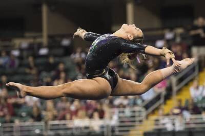 Ashleigh Gnat on Beam credit: LSU Sports