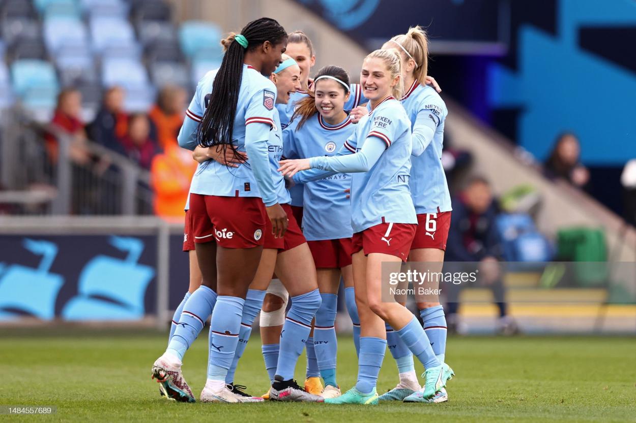 <strong><a  data-cke-saved-href='https://www.vavel.com/en/football/2023/03/19/womens-football/1141263-gareth-taylors-city-need-to-learn-from-cup-defeat-at-villa.html' href='https://www.vavel.com/en/football/2023/03/19/womens-football/1141263-gareth-taylors-city-need-to-learn-from-cup-defeat-at-villa.html'>Chloe Kelly</a></strong> of Manchester City celebrates with teammates after scoring the team's first goal during the FA Women's Super League match between Manchester City and West Ham United at The Academy Stadium on April 23, 2023 in Manchester, England. (Photo by Naomi Baker/Getty Images)