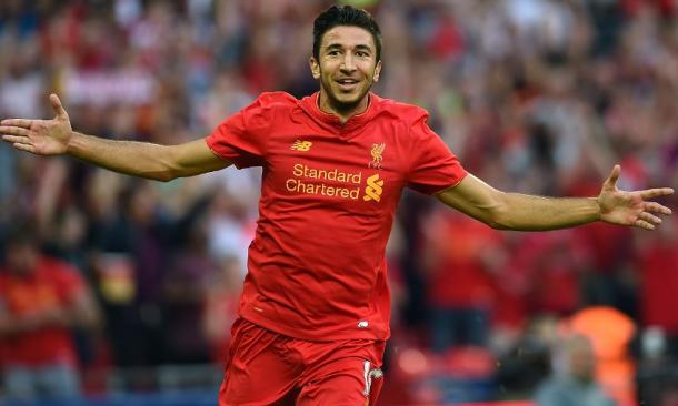 Grujic celebrates scoring the fourth of the night. (Picture: Liverpool FC via Getty Images)