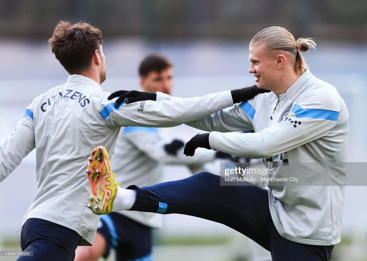 Erling Haaland and John Stones in training. (Photo by Matt McNulty - <strong><a  data-cke-saved-href='https://www.vavel.com/en/football/2023/01/21/1135319-everton-vs-west-ham-united-womens-super-league-preview-gameweek-12-2023.html' href='https://www.vavel.com/en/football/2023/01/21/1135319-everton-vs-west-ham-united-womens-super-league-preview-gameweek-12-2023.html'>Manchester City</a></strong>/<strong><a  data-cke-saved-href='https://www.vavel.com/en/football/2023/01/21/1135319-everton-vs-west-ham-united-womens-super-league-preview-gameweek-12-2023.html' href='https://www.vavel.com/en/football/2023/01/21/1135319-everton-vs-west-ham-united-womens-super-league-preview-gameweek-12-2023.html'>Manchester City</a></strong> FC via Getty Images)