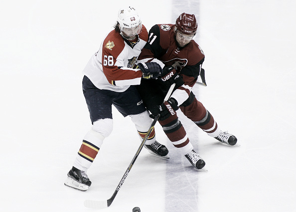 Jaromir Jagr #68 of the Florida Panthers and Martin Hanzal #11 of the Arizona Coyotes battle for the puck during the first period at Gila River Arena on March 5, 2016 in Glendale, Arizona. Jagr entered the game needing a goal or an assist to move into third place on the NHL's all-time points list passing Gordie Howe. (Photo by Ralph Freso/Getty Images)