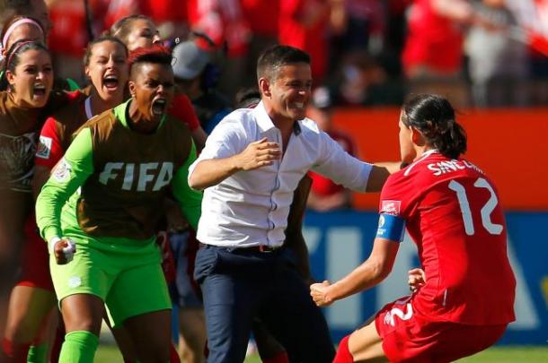 Christine Sinclair (Center) will need to be constantly testing the American back line on Sunday in the final. Photo provided by Kevin C. Cox-Getty Images,