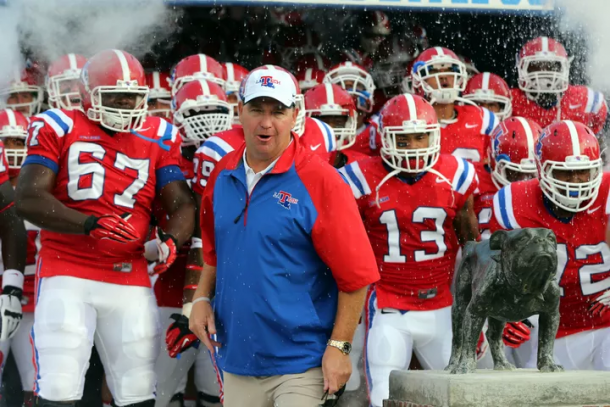 Louisiana Tech head coach Skip Holtz leads his team out of the locker room/Getty Images