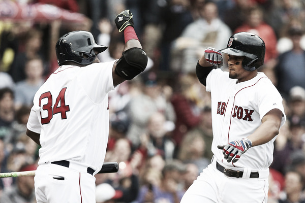 Xander Bogaerts (right) and David Ortiz (left) celebrate after Bogaerts' home run in the fourth inning. (Photo: Adam Glanzman/Getty Images North America)