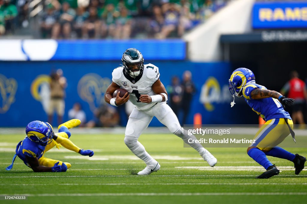Jalen Hurts #1 of the Philadelphia Eagles runs with the ball in the second quarter against the Los Angeles Rams at SoFi Stadium on October 08, 2023 in Inglewood, California. (Photo by Ronald Martinez/Getty Images)
