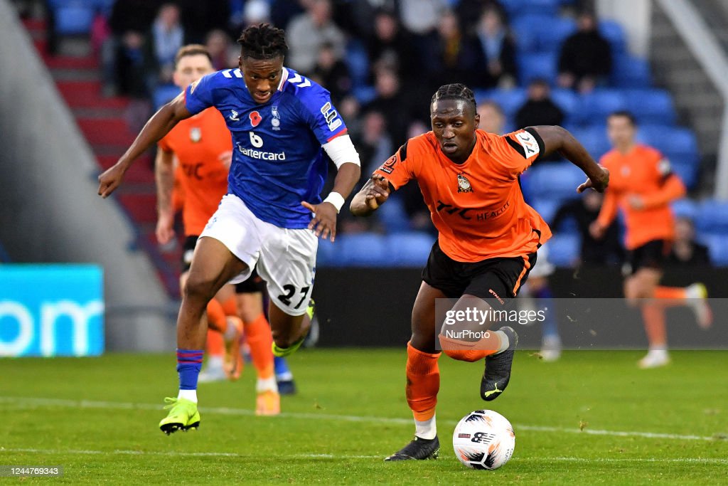 Timmy Abraham of Oldham Athletic tussles with Idris Kanu of Barnet Football Club during the Vanarama National League match between Oldham Athletic and Barnet at Boundary Park, Oldham on Saturday 12th November 2022. (Photo by Eddie Garvey/MI News/NurPhoto via Getty Images)