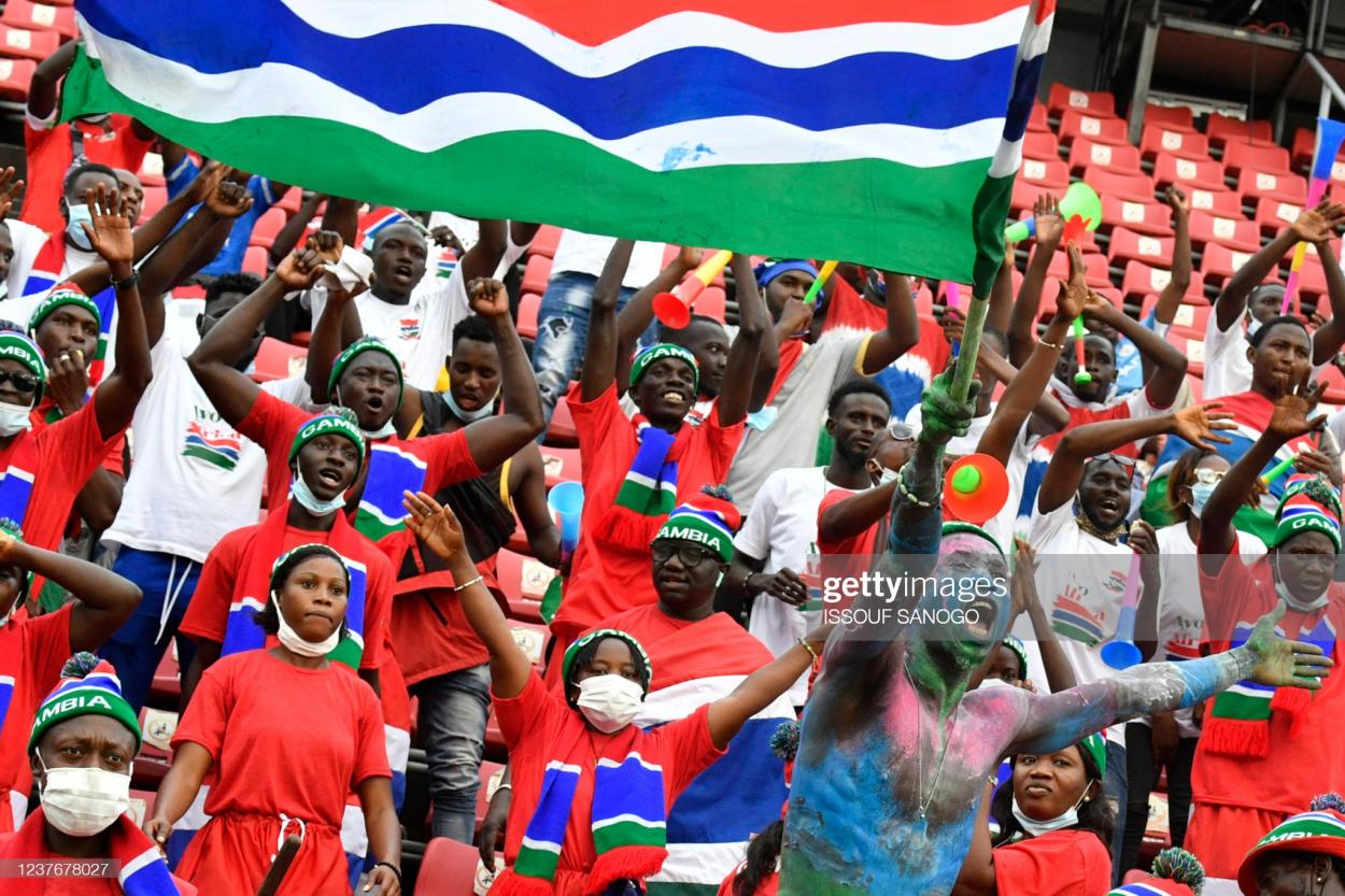 Gammbia's supporters react before the Group F Africa Cup of Nations (CAN) 2021 football match between Mauritania and Gambia at Limbe Omnisport Stadium in Limbe on January 12, 2022. (Photo by Issouf SANOGO / AFP) (Photo by ISSOUF SANOGO/AFP via Getty Images)