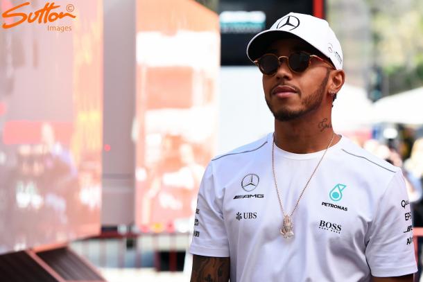 Fan opinion of Hamilton is divided, but he prefers to do his talking on track. (Image Credit: Sutton Images)