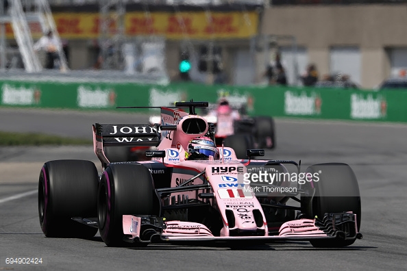 Ocon (rear) pleaded to be let past Perez to attack Ricciardo, but the Mexican ruthlessly refused to budge. (Image Credit: Mark Thompson/Getty Images)