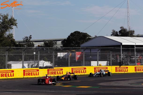 The key moment. Hamilton couldn't pass Verstappen and allowed Vettel to pit in and get out ahead. (Image Credit:  Sutton Images)
