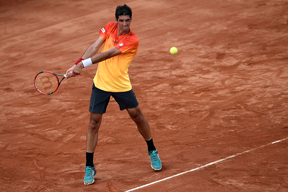 Thomaz Bellucci returning a shot in his match against Alexandr Dolgopolov at Rio Open (Photo:Buda Mendes/Getty Images)