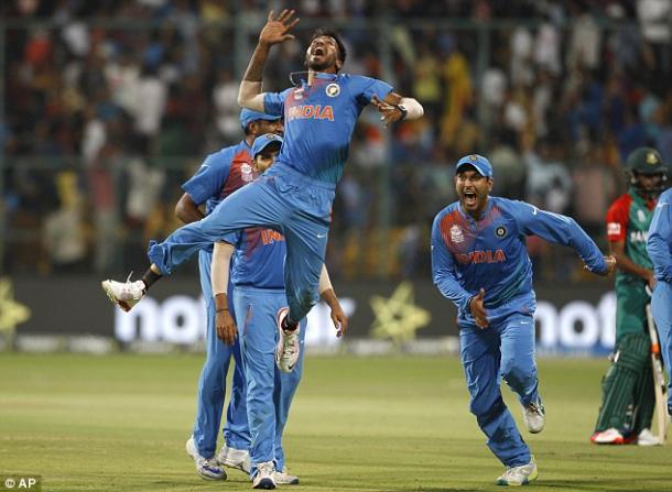 India celebrate their dramatic win against Bangladesh (photo: AP)