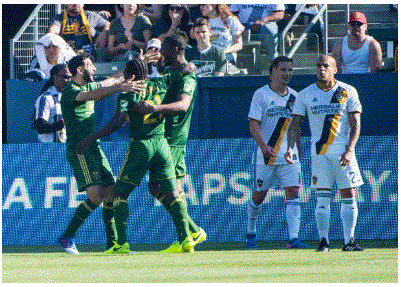 Portland players celebrate after Diego Chara's goal against the LA Galaxy | Source: Shaun Clark - Getty Images