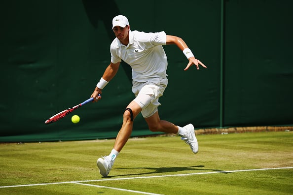 Isner served superbly to take a one-sided tie-breaker (Photo: Getty Images/Ian Walton)