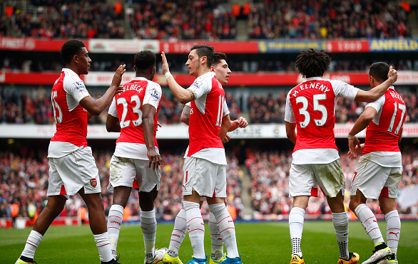 Alex Iwobi (far left) celebrates his well-taken finish to double Arsenal's comfortable lead | Photo: Getty