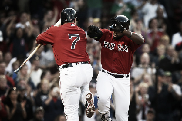 Christian Vazquez (left) and Jackie Bradley Jr. (right) celebrate after Bradley's home run in the second inning. 