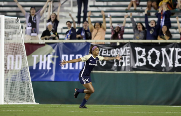 Jess McDonald celebrates after scoring the go-ahead goal for the second consecutive home match. | Photo: @ReignFC