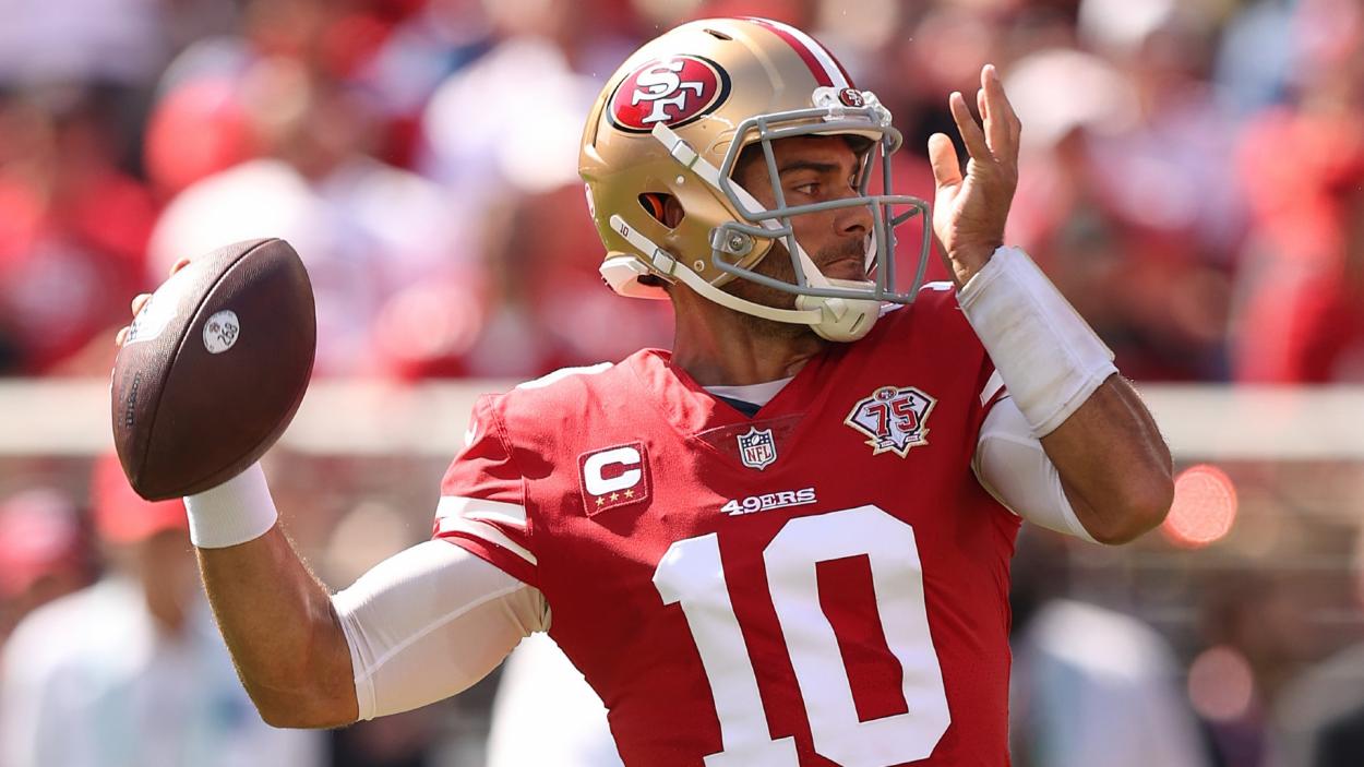 Green Bay, United States. 22nd Jan, 2022. San Francisco 49ers' Jimmy  Garoppolo (10) throws during warmups before a NFC divisional playoff NFL  game against the Green Bay Packers at Lambeau Field in