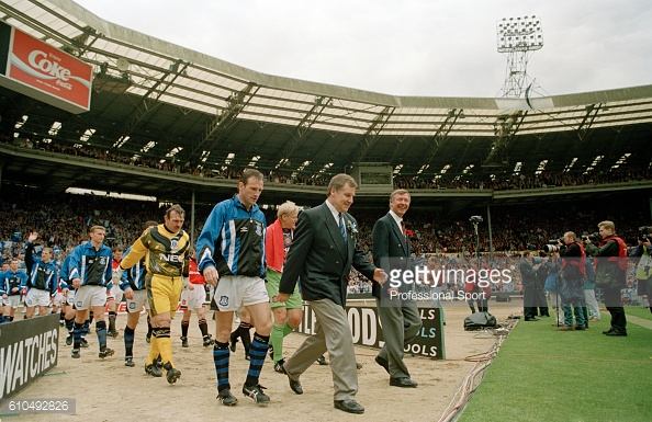 Joe Royle knows what it's like to be a successful Everton manager - as he is pictured leading his side out to what would be Everton's first cup win in four years | Photo: Getty images