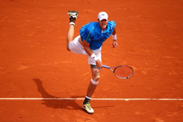 John Isner in action (Source: Clive Brunskill/Getty Images) 