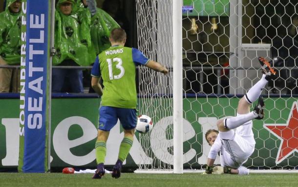 Jordan Morris pounces on a loose ball in the box against the Colorado Rapids. (Source: Ted S. Warren/AP Photo)